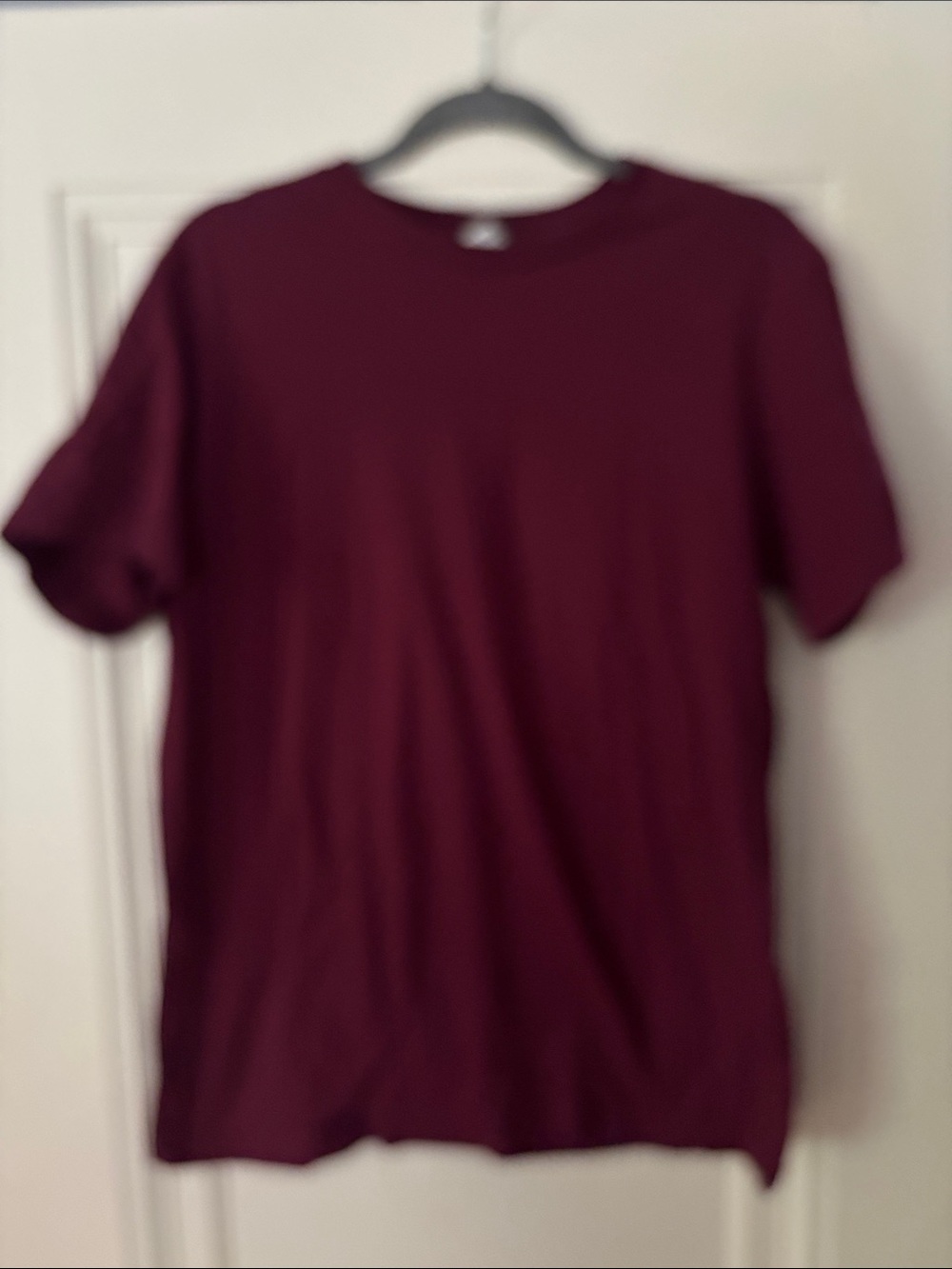 Men's Short Sleeve Crew Tee in Deep Burgundy. DOMINIC FIKE logo on back.